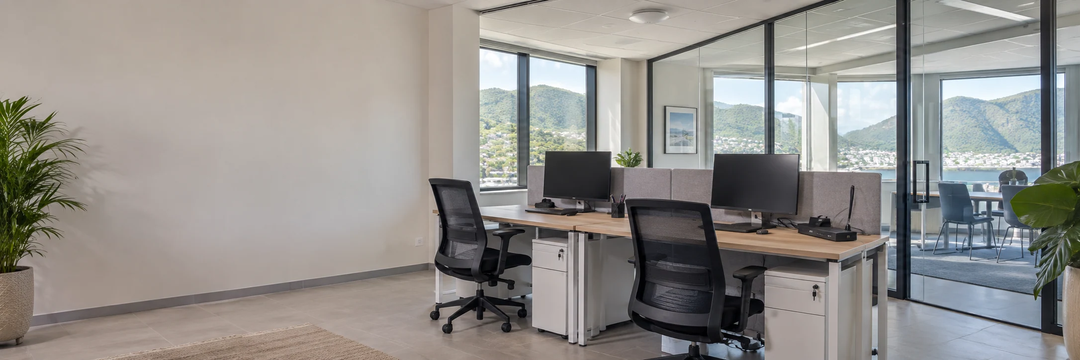 Illustrative fitted Caribbean office with network-connected workstations